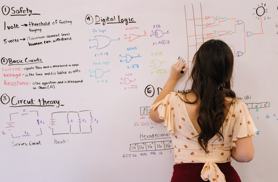 AI certification path comparison diagram displayed on a whiteboard in a training room
