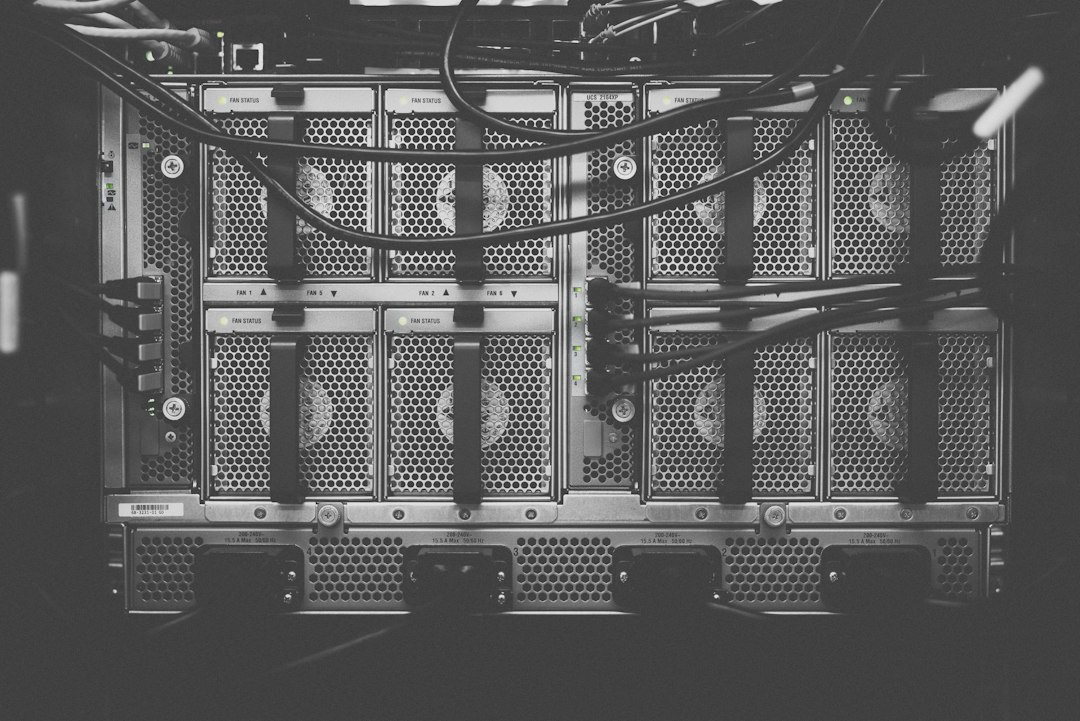 Network engineer configuring Cisco routers and switches in a professional training lab environment