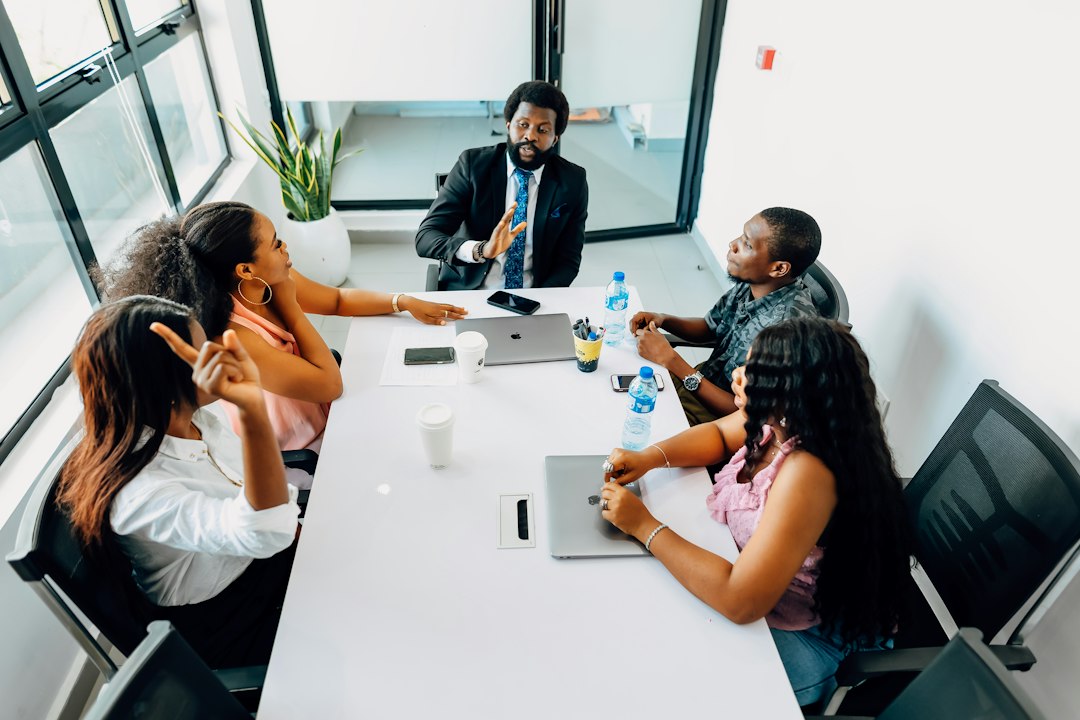 IT team collaboration and communication skills development session in the workplace